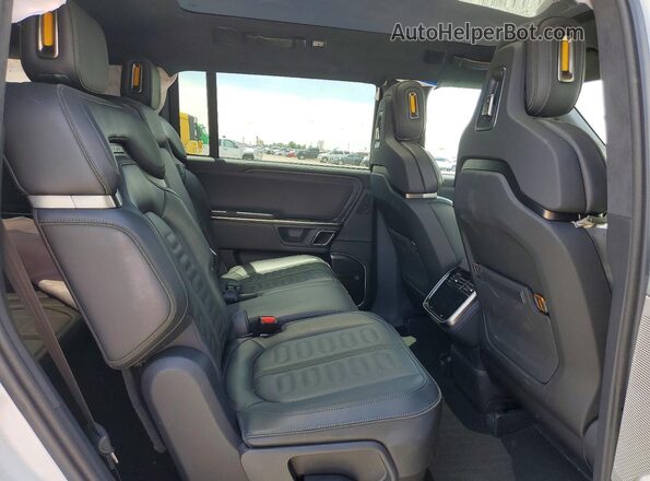 7PDSGABAXRN043642 2024 RIVIAN R1S White Rear interior view