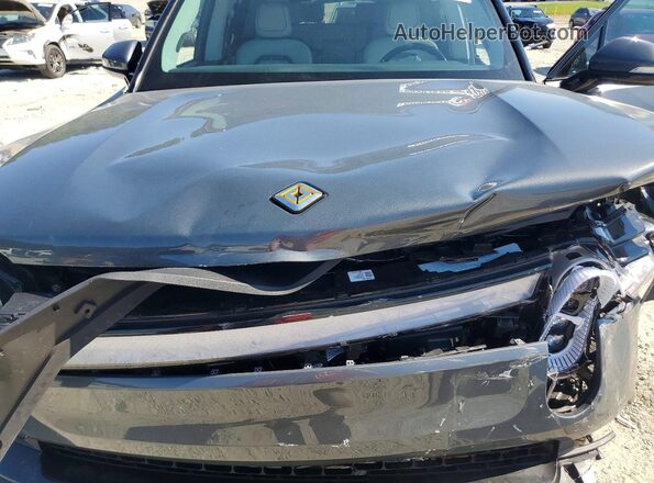 7PDSGABL3PN020878 2023 RIVIAN R1S Gray Rear interior view