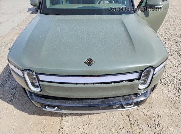 7PDSGABL6PN009440 2023 RIVIAN R1S Green Rear interior view