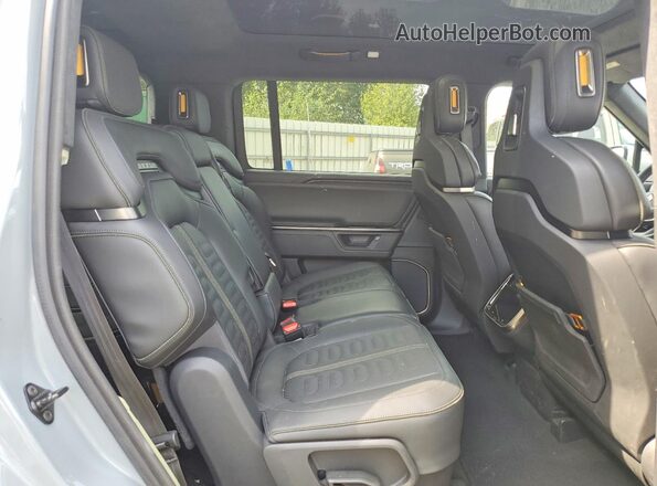 7PDSGBBA1SN047509 2025 RIVIAN R1S Gray Rear interior view
