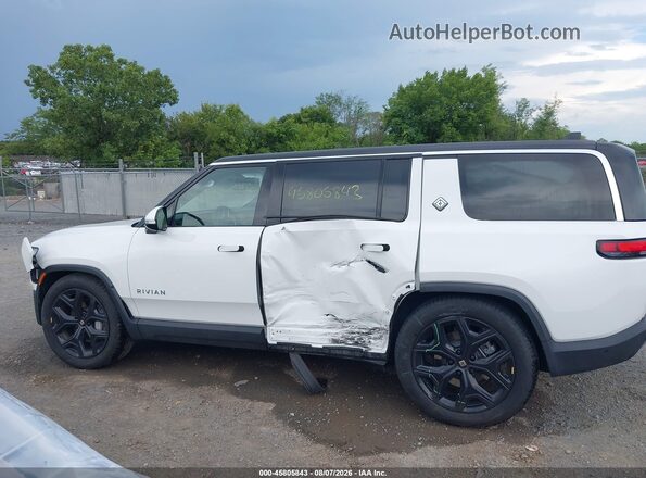 7PDSGBBA9RN037210 2024 RIVIAN R1S White Rear interior view
