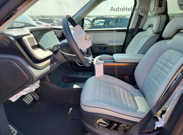 7PDSGCBP3SN071594 2025 RIVIAN R1S Gray Front interior view