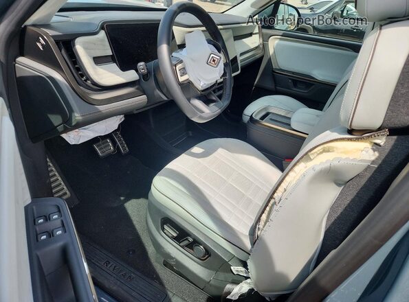 7PDSGCBP3SN071594 2025 RIVIAN R1S Gray Dashboard view