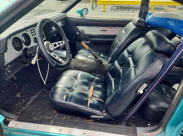 7R03F102360 1977 FORD MUSTANG Turquoise Вид панелі приладів