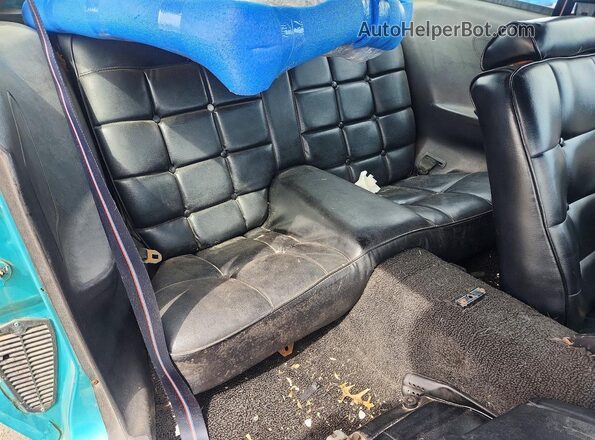 7R03F102360 1977 FORD MUSTANG Turquoise Вид задньої частини салону