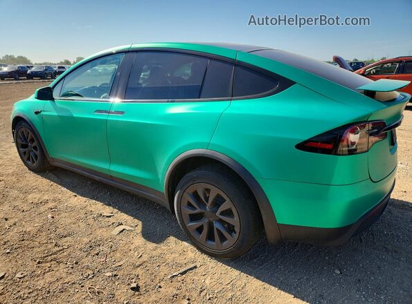 7SAXCAE5XRF459179 2024 TESLA MODEL Green Rear left