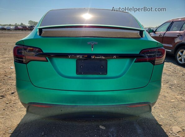 7SAXCAE5XRF459179 2024 TESLA MODEL Green Rear view