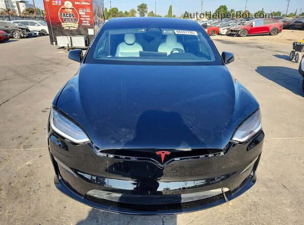 7SAXCBE61PF404194 2023 TESLA MODEL X Черный Вид салона спереди