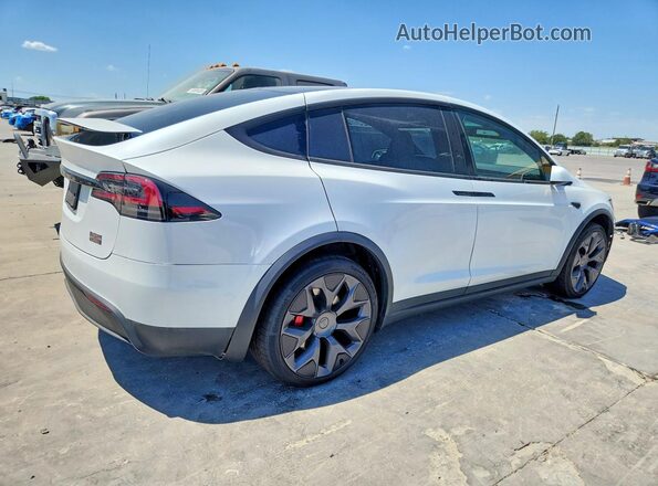 7SAXCBE68TF486676 2026 TESLA MODEL White Trasero derecho