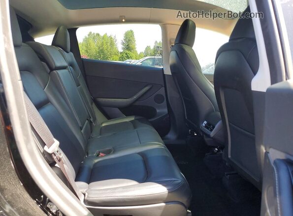 7SAYGAEE0RF190392 2024 TESLA MODEL Black უკანა სალონის ხედი