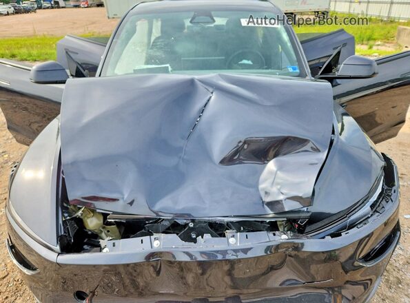 7SAYGAEE1TF617781 2026 TESLA MODEL Charcoal Սալոնի հետևի տեսք
