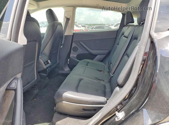 7SAYGAEE4PF899646 2023 TESLA MODEL Black Widok wnętrza z tyłu