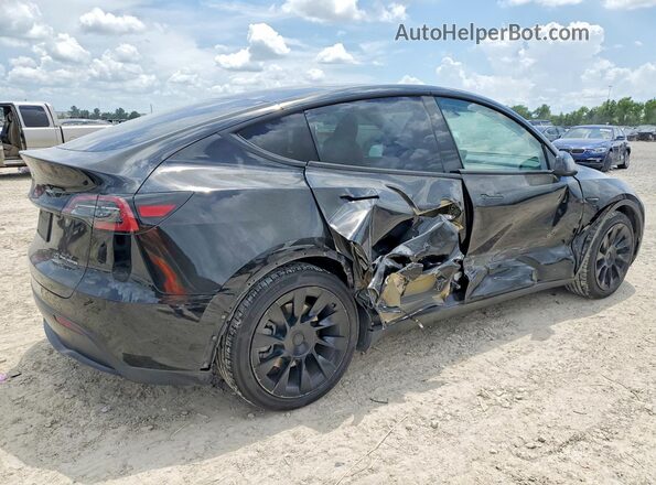 7SAYGAEE4PF899646 2023 TESLA MODEL Black Tył prawy