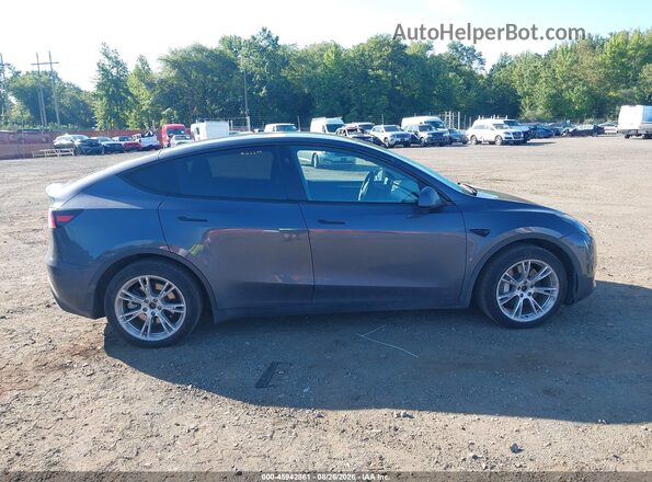 7SAYGAEE4PF912959 2023 TESLA MODEL Y Gray Вид задньої частини салону