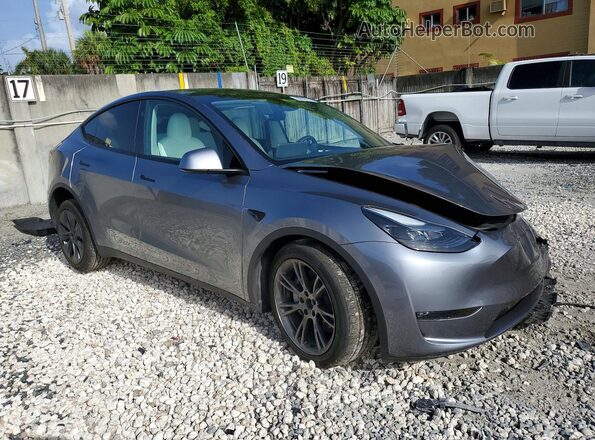 7SAYGAEE4RF209879 2024 TESLA MODEL Silver Front right