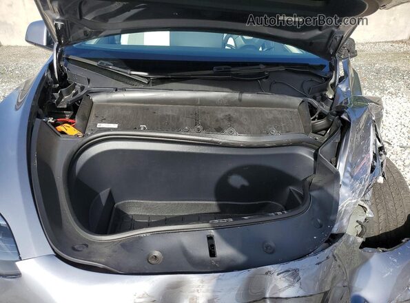 7SAYGAEE4RF209879 2024 TESLA MODEL Silver Rear interior view