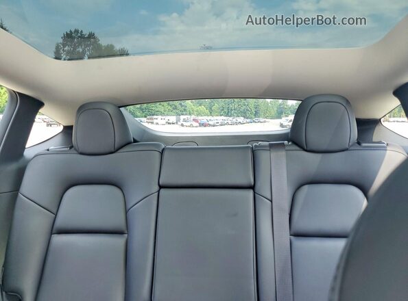 7SAYGAEE5NF329894 2022 TESLA MODEL White Հետևի նստատեղերի տեսք