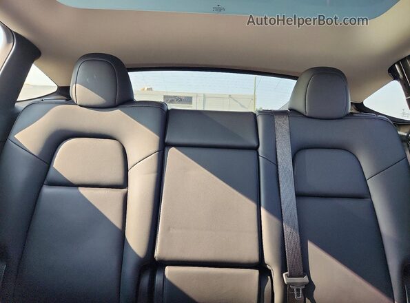 7SAYGAEE5PF696829 2023 TESLA MODEL Black Vista de los asientos traseros