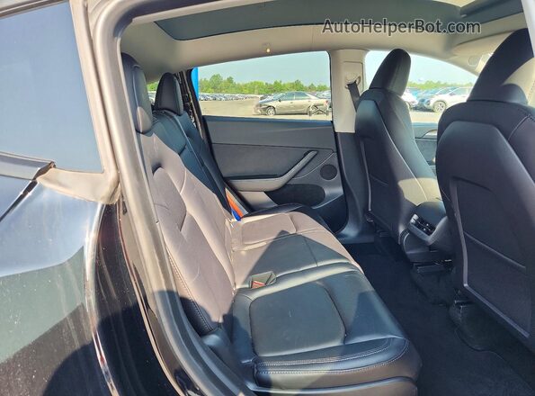 7SAYGAEE5PF696829 2023 TESLA MODEL Black Vista interior trasera