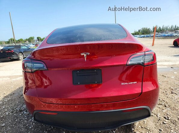 7SAYGAEE5RF114862 2024 TESLA MODEL Red Rear view