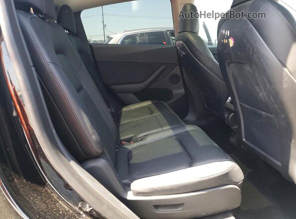 7SAYGAEE7PF698954 2023 TESLA MODEL Black Rear seats view