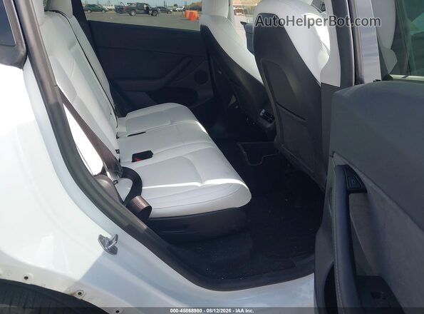 7SAYGAEE7RF189871 2024 TESLA MODEL Y White VIN կոդի պիտակի տեսք