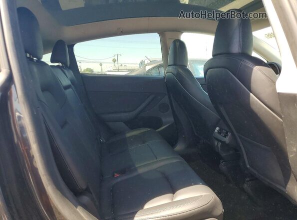 7SAYGAEE8RF027960 2024 TESLA MODEL Gray უკანა სალონის ხედი