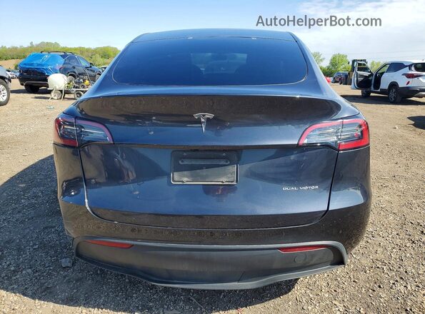 7SAYGAEE8RF080979 2024 TESLA MODEL Black Rear view
