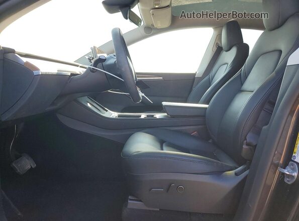 7SAYGAEE8RF080979 2024 TESLA MODEL Black Front interior view