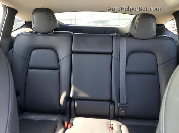 7SAYGAEE8RF080979 2024 TESLA MODEL Black Rear seats view