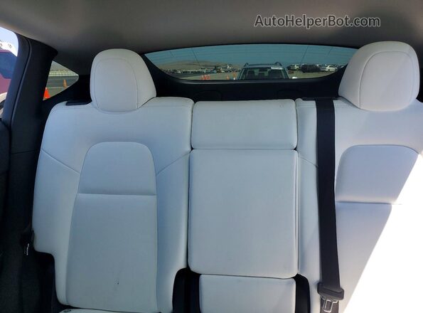 7SAYGAEE8RF163831 2024 TESLA MODEL Red Вид задніх сидінь