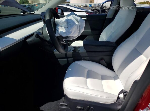 7SAYGAEE8RF163831 2024 TESLA MODEL Red Вид салону спереду