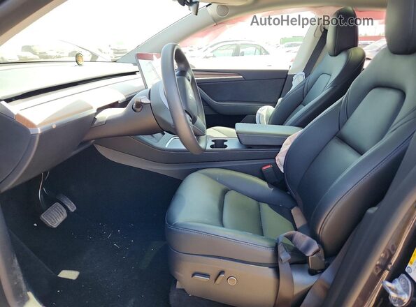 7SAYGAEE9RF201891 2024 TESLA MODEL Charcoal Вид салону спереду