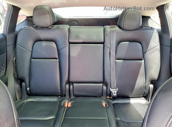7SAYGAEE9SF247453 2025 TESLA MODEL Red უკანა სავარძლების ხედი
