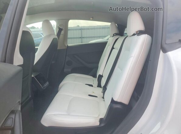 7SAYGAEEXRF073760 2024 TESLA MODEL White Rear seats view
