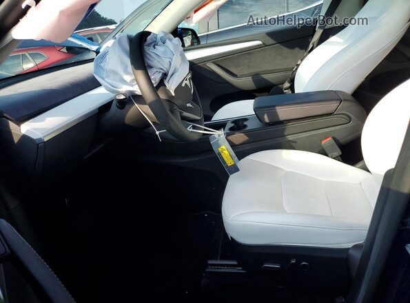 7SAYGAEEXRF202774 2024 TESLA MODEL Синий Вид салона спереди