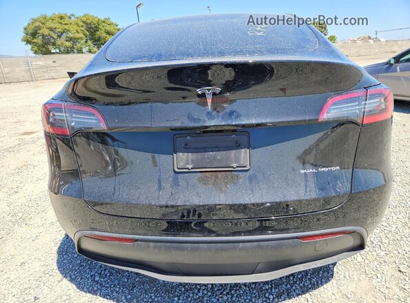 7SAYGAEEXSF271552 2025 TESLA MODEL Black უკანა ხედი