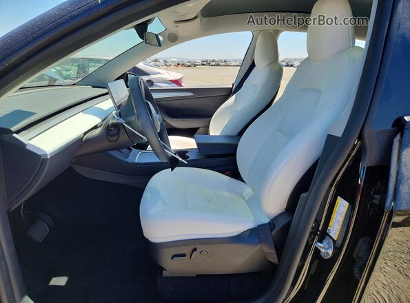 7SAYGAEEXSF271552 2025 TESLA MODEL Black წინა სალონის ხედი