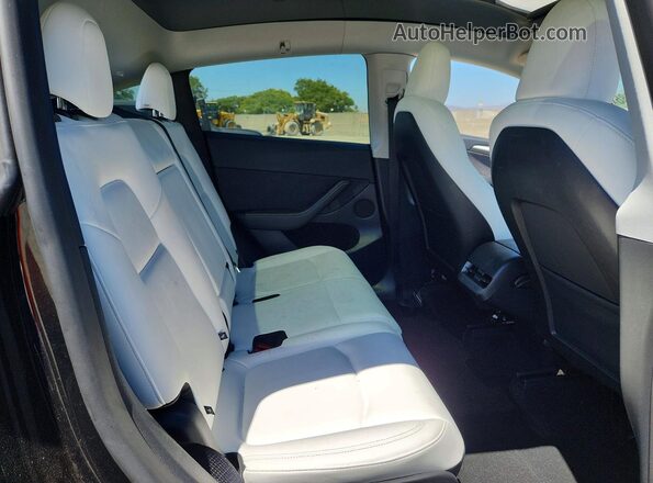 7SAYGAEEXSF271552 2025 TESLA MODEL Black უკანა სავარძლების ხედი
