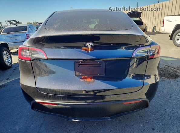 7SAYGDED0RF119184 2024 TESLA MODEL Gray Rear view