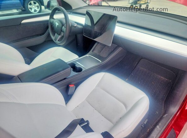 7SAYGDED0SA337242 2025 TESLA MODEL Красный Вид панели приборов