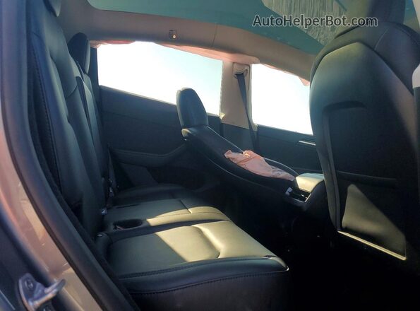 7SAYGDED0SA362822 2025 TESLA MODEL Silver Vista de los asientos traseros
