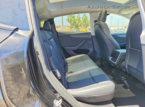 7SAYGDED0TA425404 2026 TESLA MODEL Black Rear seats view