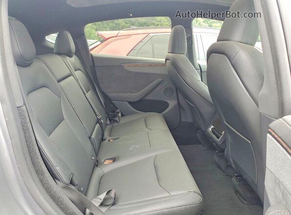 7SAYGDED0TA721829 2026 TESLA MODEL Gray Vista de los asientos traseros