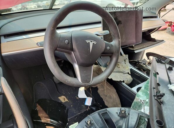 7SAYGDED1RF096398 2024 TESLA MODEL Maroon Vista del salpicadero