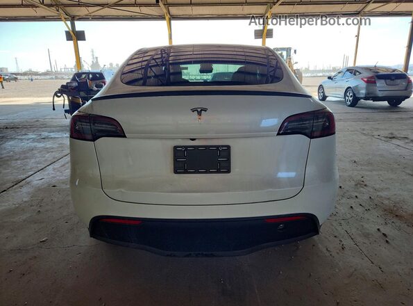 7SAYGDED1RF193049 2024 TESLA MODEL White Հետևի տեսք