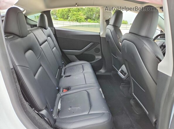 7SAYGDED1SF320873 2025 TESLA MODEL White უკანა სავარძლების ხედი