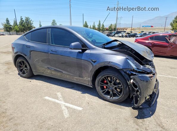 7SAYGDED1SF321151 2025 TESLA MODEL Gray Front right