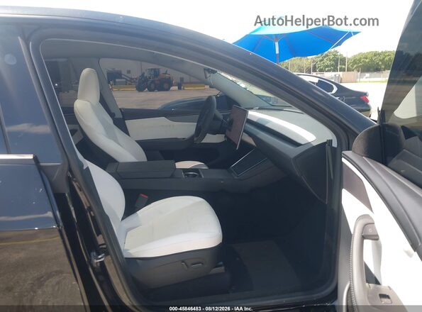 7SAYGDED1TA417652 2026 TESLA MODEL Y Black Front interior view