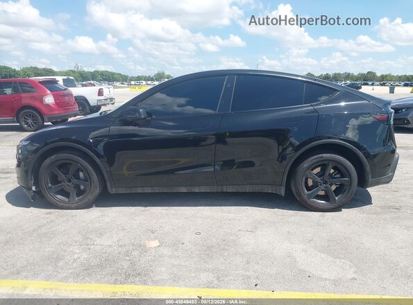 7SAYGDED1TA417652 2026 TESLA MODEL Y Black Rear interior view